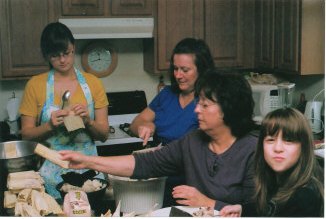 Monica, Anne M, Eva, & Hannah making tamales.