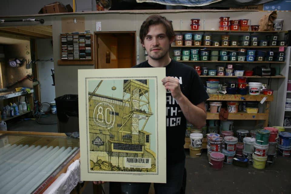 Dan Black with the Landland Prohibition Repeal Day poster.