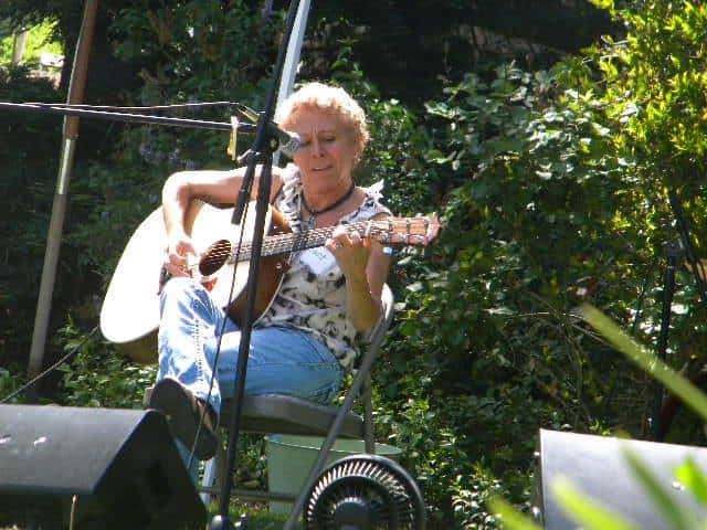 Janet Thompson, live at an outdoor gig.