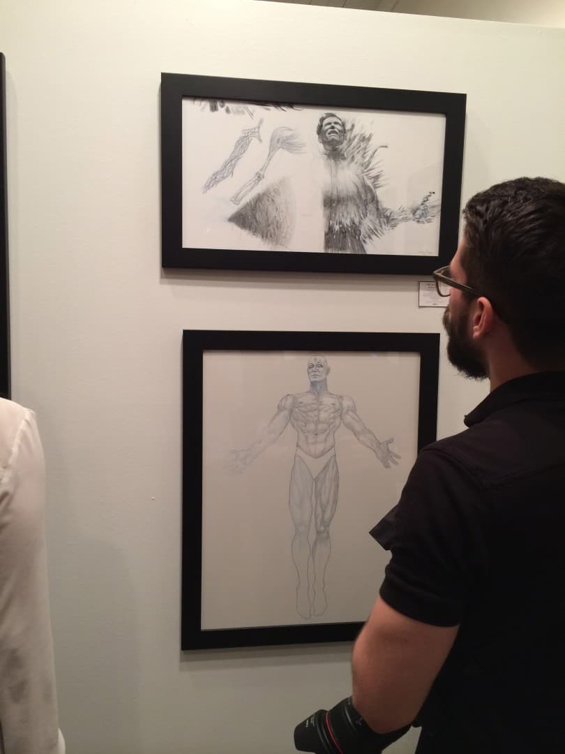Kevin Tong's original drawings for 'Dr. Manhattan' on display at his Mondo gallery show with Martin Ansin