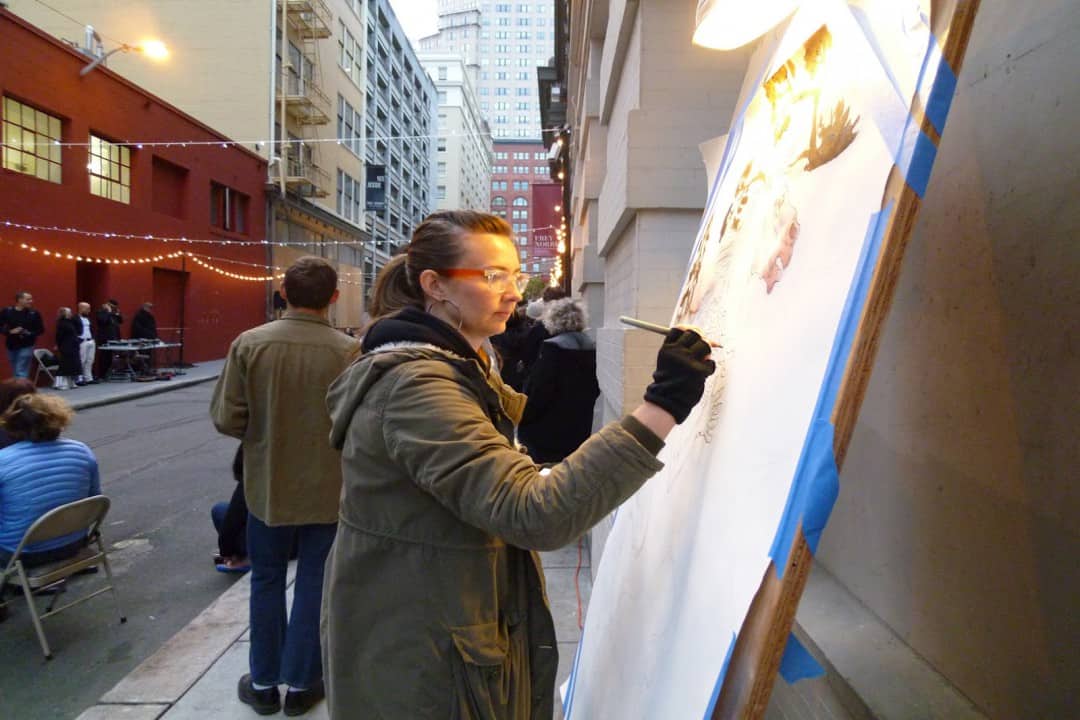 Helen Bayly drawing live in downtown San Francisco for an outdoor event.