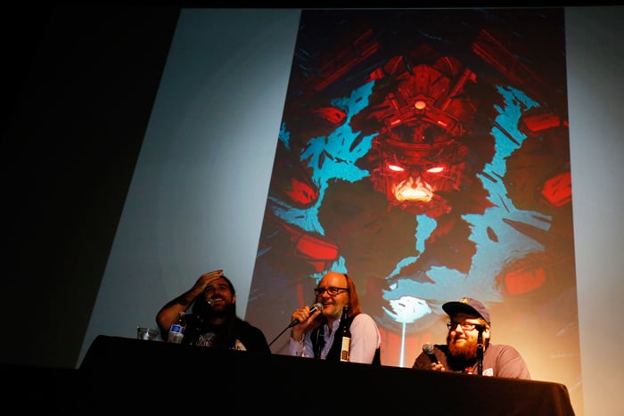 Justin Ishmael (L), Rob Jones (C), and Mitch Putnam (R) on stage during Mondo-Con 2014.