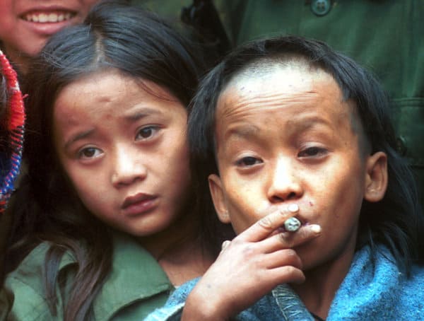 Johnny, left, and Luther Htoo, age 12, in 1999. Credit Apichart Weerawong / Associated Press.